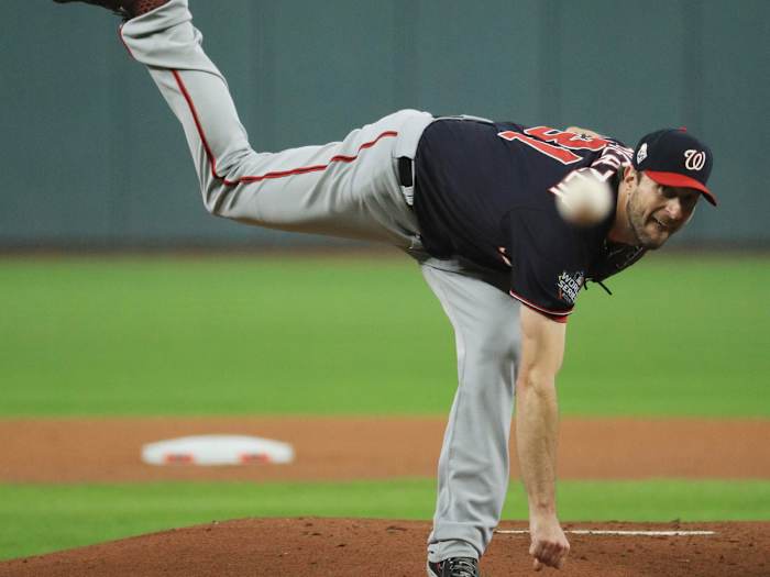 Max Scherzer unfurls a pitch in the 2019 World Series.
